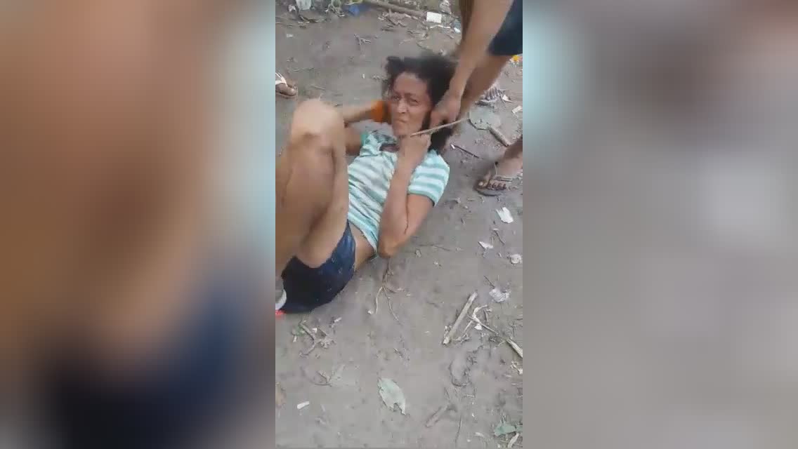 Beaten woman shot dead in the woods