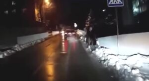 A car hits a woman in a crosswalk russia