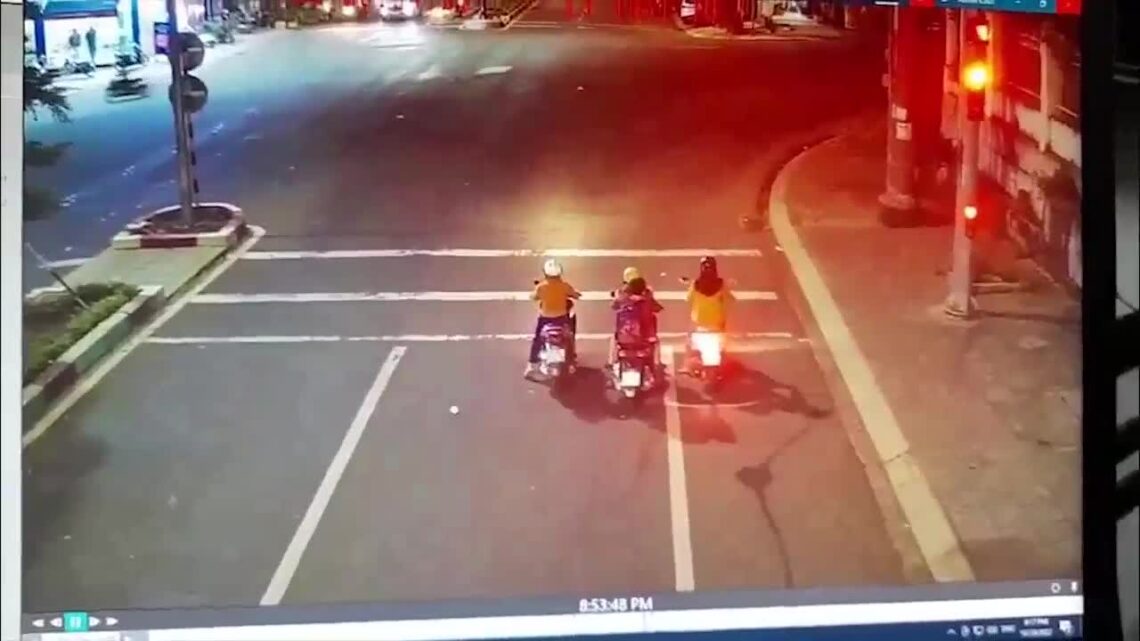 An auto knocked down 3 motorcyclists standing up at a website traffic