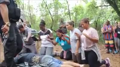 An authorities soldier eliminates a man in front end of his family members