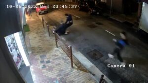 A guy is actually eliminated when driving by a crowd of mobsters hong kong