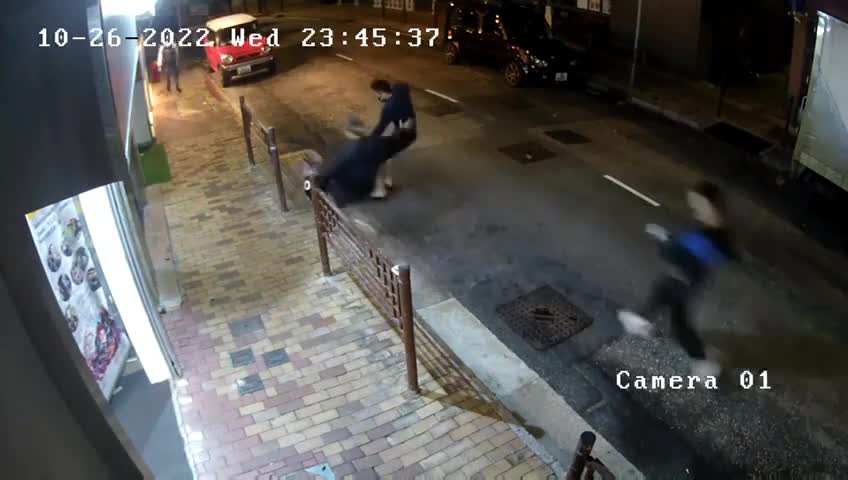 A guy is actually eliminated when driving by a crowd of mobsters hong kong