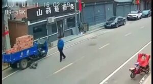 A vehicle packed along with bricks ran over its own driver