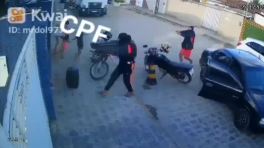 4 killers shoot a male waiting for a taxicab