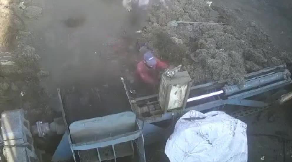 Holy crap! worker obtains sucked into maker