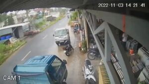Like a puck in a goal motorcyclist soared under the tires