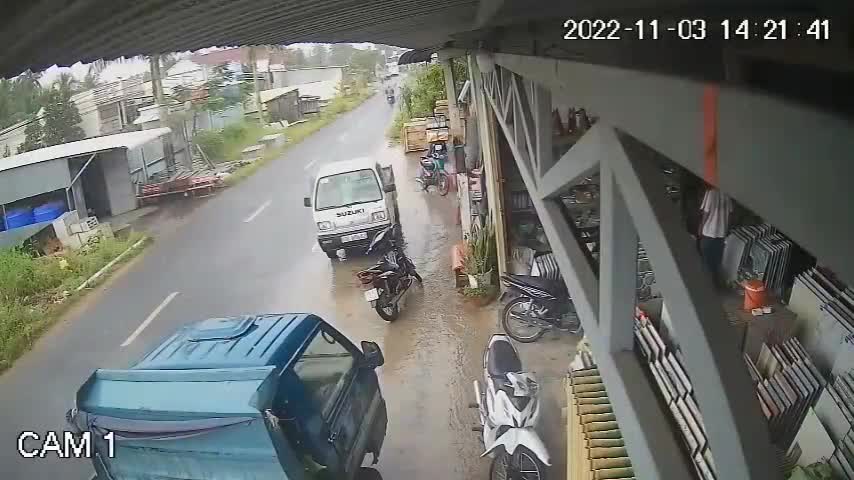 Like a puck in a goal motorcyclist soared under the tires