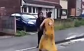 Guy found out film attacking girl in road armed with knife