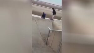 Adolescent viciously strikes guy and robs him