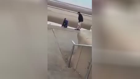 Adolescent viciously strikes guy and robs him
