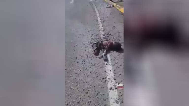 Horrible incident many torn bodies scattered along the street