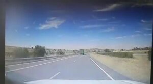 2 people bumping into a roadway in south africa