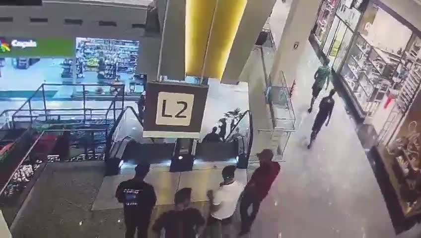 A male was shot correct the escalator at the taquara plaza