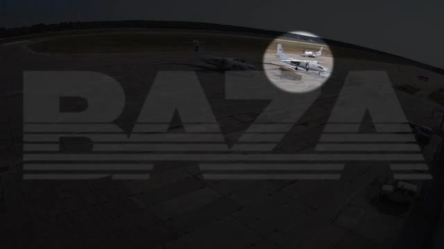 An airport employee was blown off his head by an airplane prop