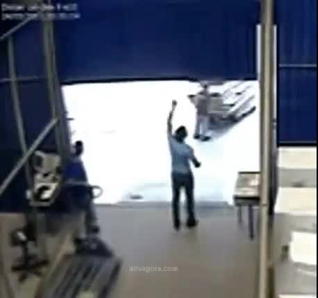 Warehouse employee crushed by collapsing gate