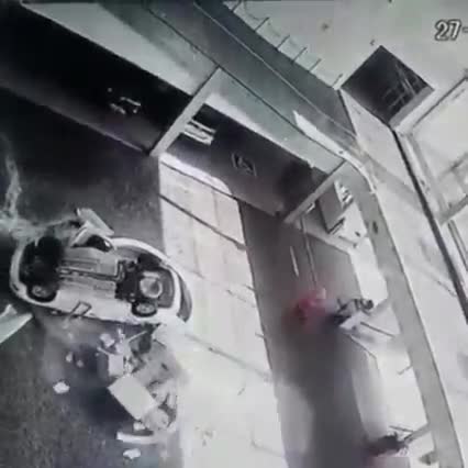 Female crushed by a falling automobile
