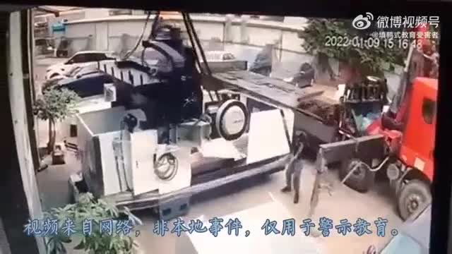 Employee crushed by falling machinery