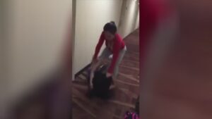 Two girls fighting each other