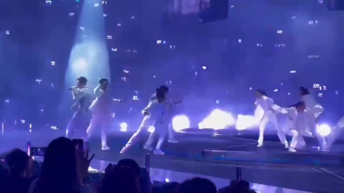 Silver screen television drops on dancers in the course of concert