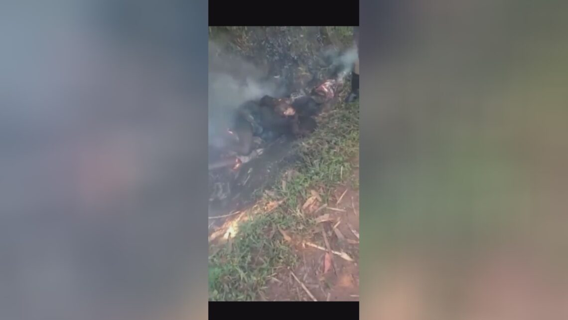 Scorched man accomplished with sticks