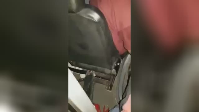 Bus chauffeur trapped in the cab due to an accident