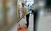 Crazy female tries to cut her own throat in a grocery store