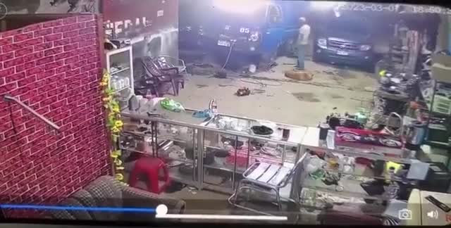 Mechanic riddled with bullets inside his shop