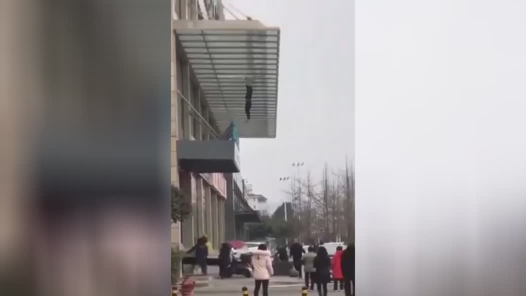 The dude was holding on the hat when yet another man dropped