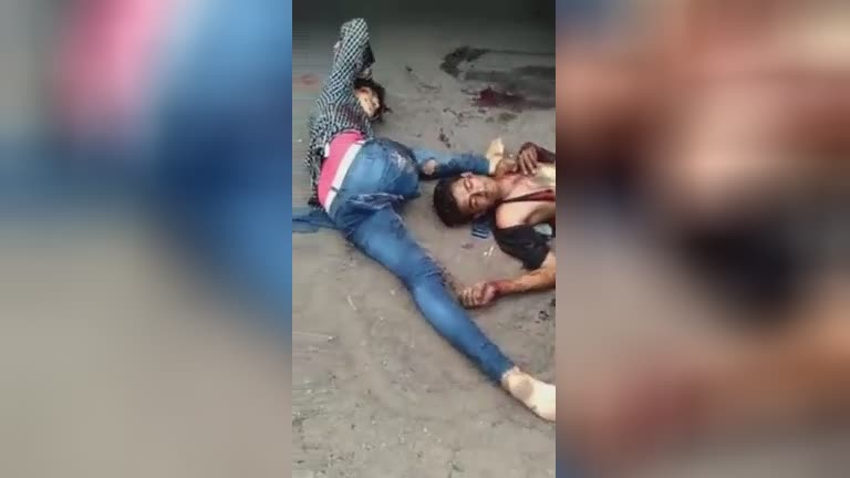 The man’s staying hand waves to the onlookers