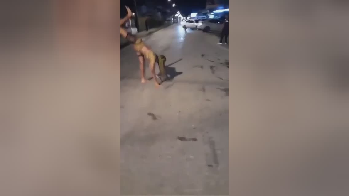 The muttonhead lady tried to depend on her palms on the road