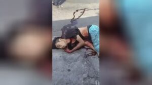 The last sighs of a motorcyclist lying on the pavement