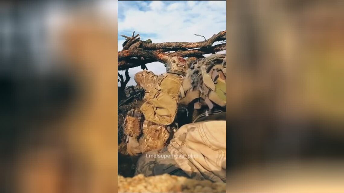 Ukrainian soldier getting go in the scalp as he preps