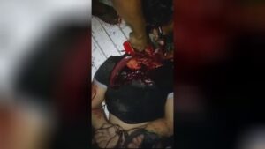 Not successful try to decapitate a bound man 1 Not successful try to decapitate a bound man