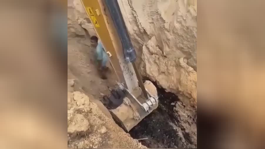 Worker is hidden to life with rocks