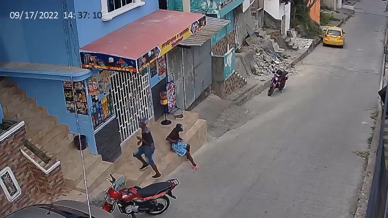 Amazing drive-by shooting captured on electronic camera in ecuador
