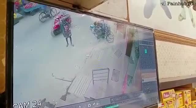 Rotten luck guy slips & tumbles right under vehicle