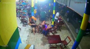 Hit man opens fire at the busy street bar killing one