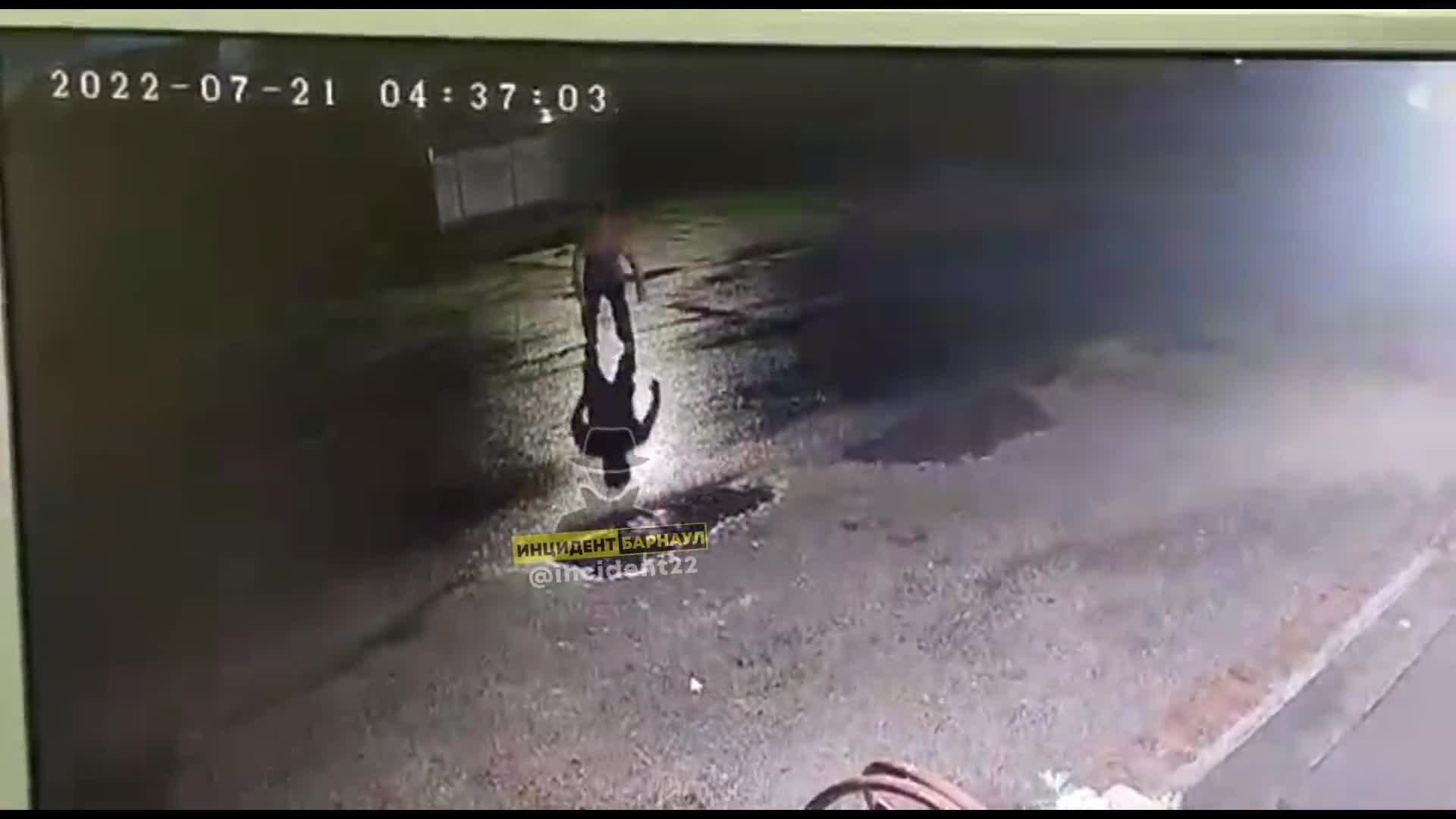 Guy sets in the road and ran over