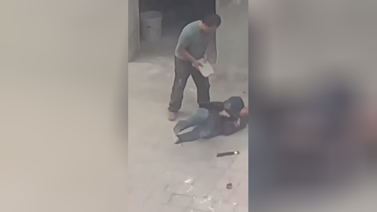 Old man brutalized with concrete piece