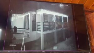 Safety and security video camera captures house criminal falling coming from 2nd floor