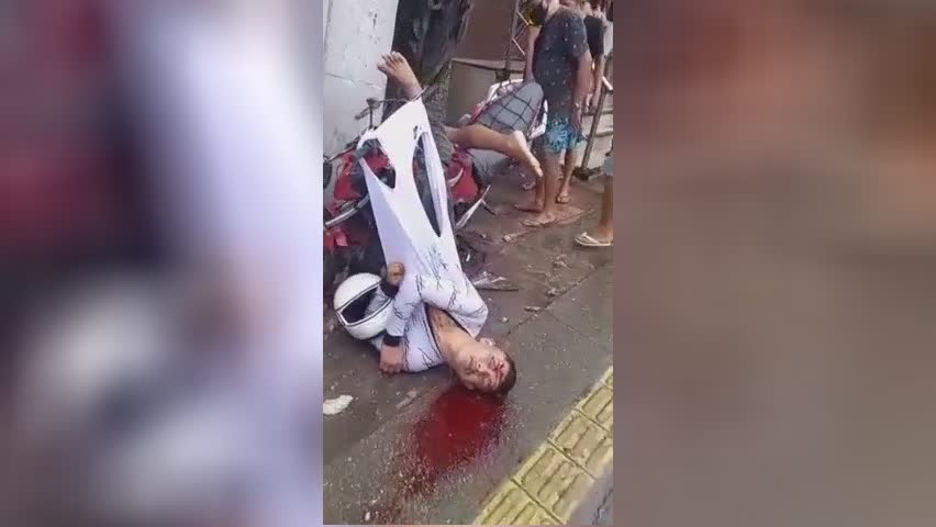 Because of the mishap, a man and a woman traveling a moto