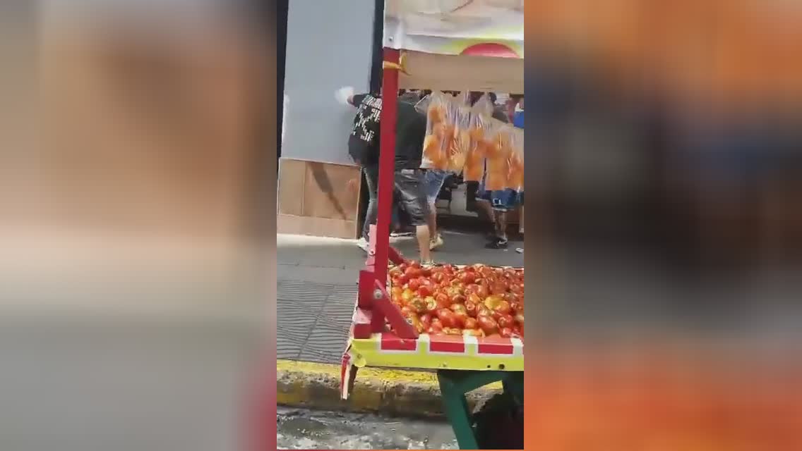 Burglar chased after through violent mob and also wounded in the back