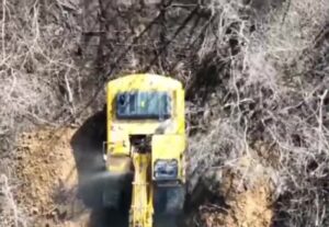 Ukrainian drone destroys russians backhoe 1 Ukrainian drone destroys russians backhoe
