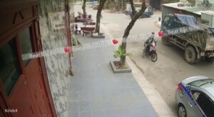 A Truck Moving In Reverse Crushed A Woman Talking On The Phone While Standing On The Road