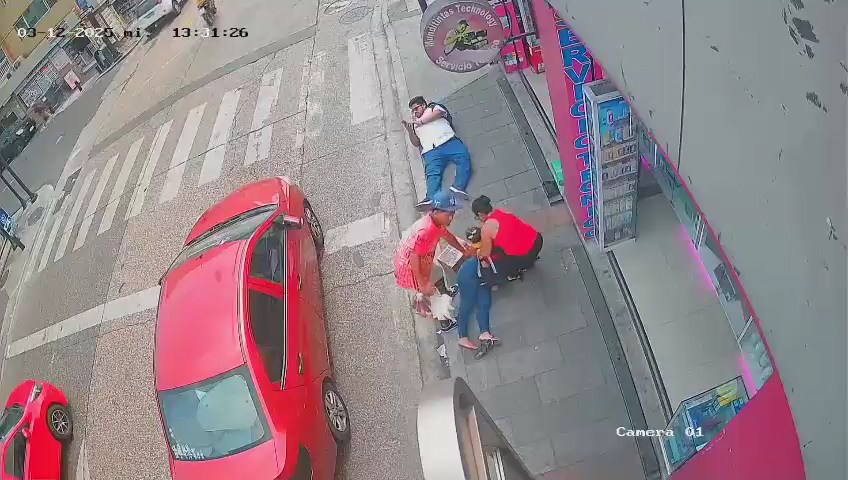 A Random Woman Is Fatally Wounded By A Stray Bullet During A Shootout Of Criminals