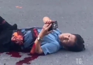 Dude Texting With His Guts Out