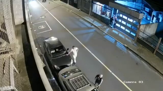The Car Hit A Man Standing At His Car