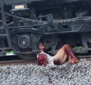 The Body Of A Teenager Hit By A Train Is Stuck Between The Wheels Of A Carriage