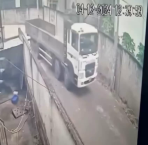 The Truck Drove Over The Legs Of The Fallen Motorcyclist. Vietnam
