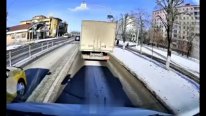 A Passenger Car Hit A Wheelchair User At A Pedestrian Crossing. Moscow Region, Russia